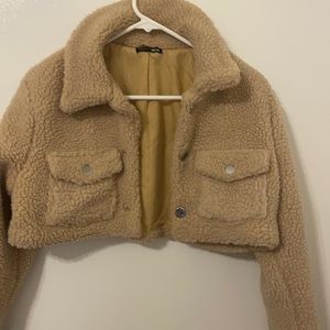 Cute beige shirt and Cozy crop jacket.